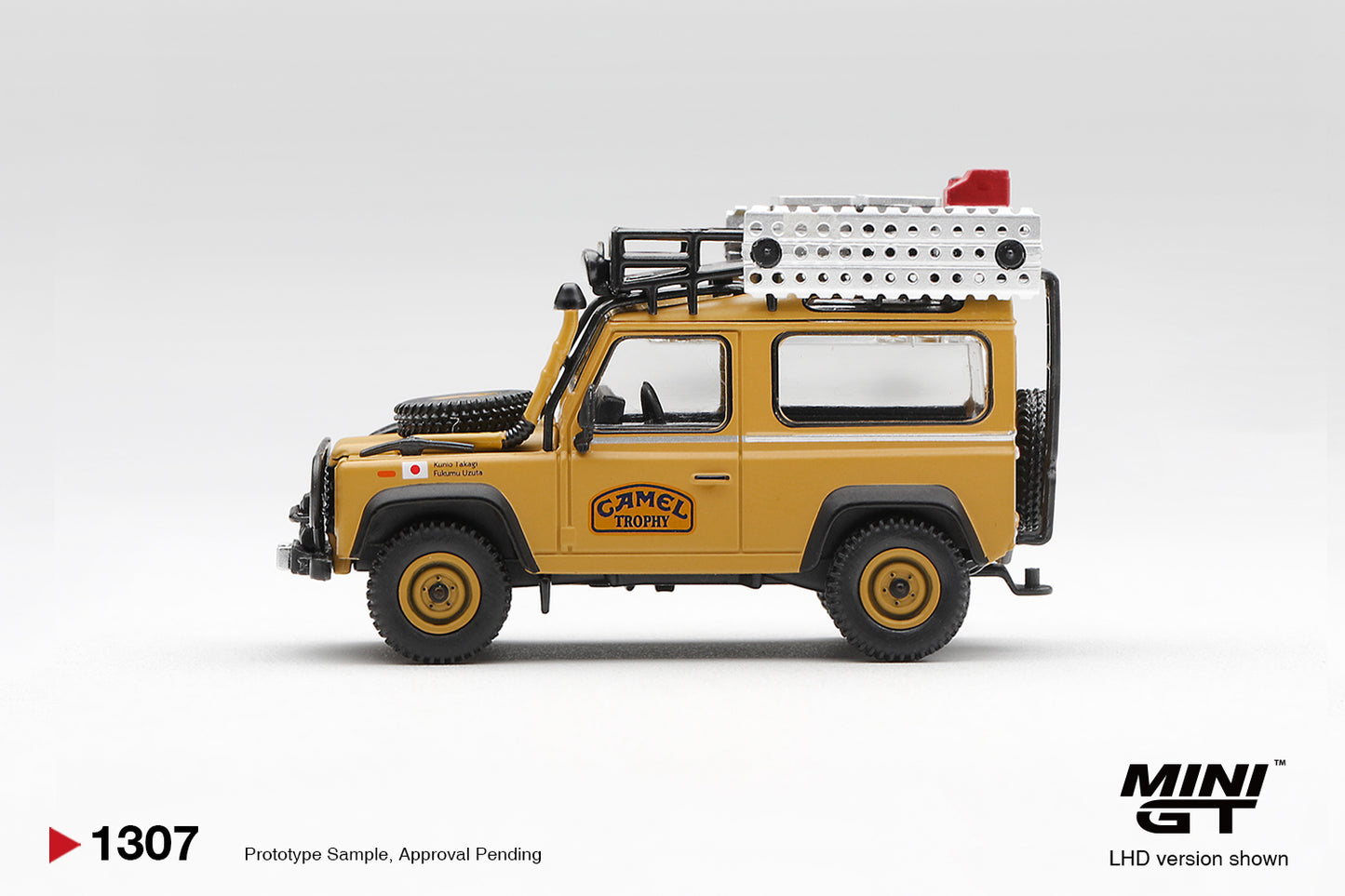 [Pre-Order] Mini GT Land Rover Defender 90 1985 Camel Trophy Borneo Team Japan MGT01307 1/64 Diecast