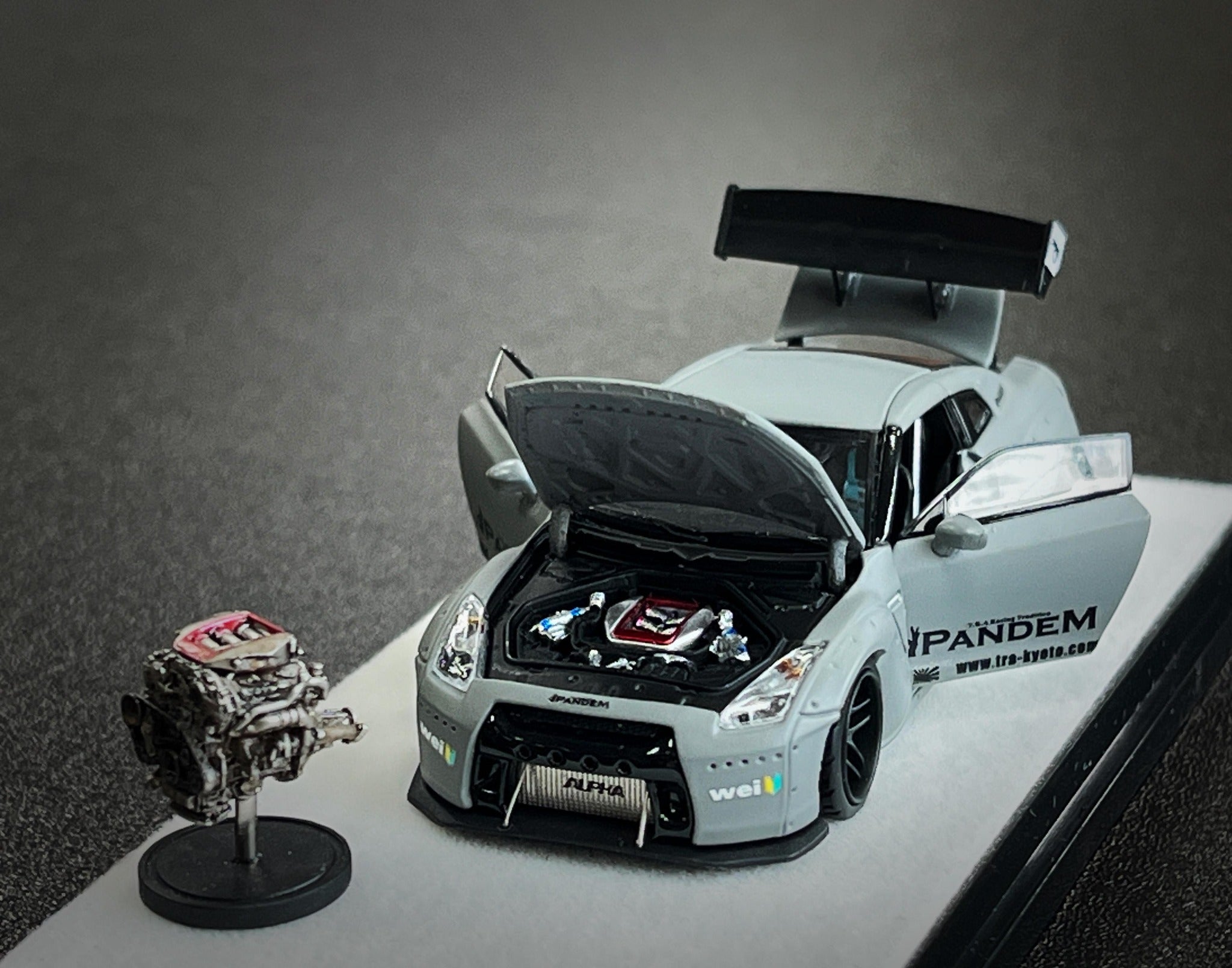 PGM Nissan GT-R R35 Pandem Rocket Bunny Combet Gray Ordinary