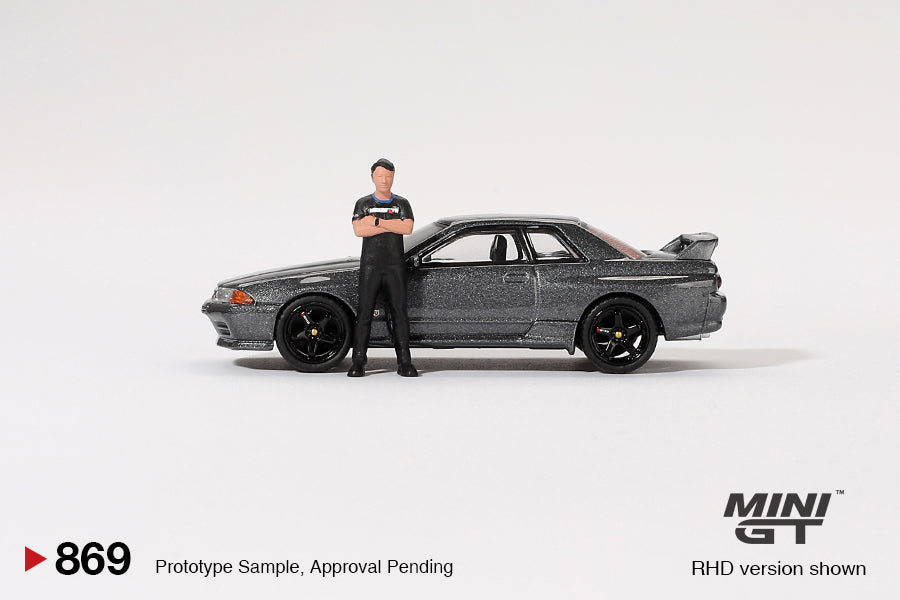 Mini GT Nissan Skyline GT-R (R32) Gunmetal W Matsuda Figure Tsugio Matsuda Collection MGT00869 1/64 Diecast