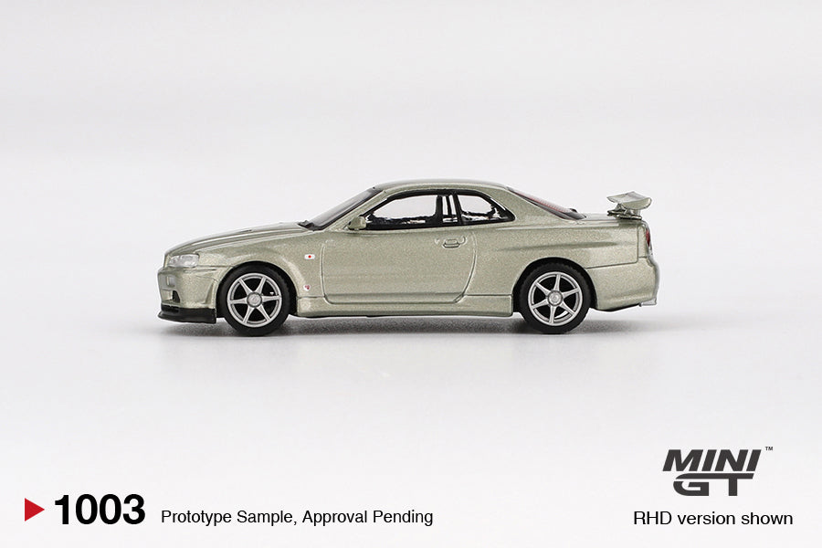 Mini GT Nissan Skyline GT-R (R34) V-Spec II Nür Millenium Jade Blister Packaging MGT01003 1/64 Diecast