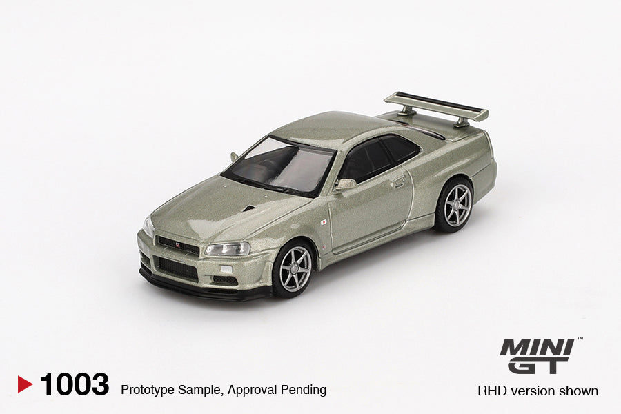Mini GT Nissan Skyline GT-R (R34) V-Spec II Nür Millenium Jade Blister Packaging MGT01003 1/64 Diecast